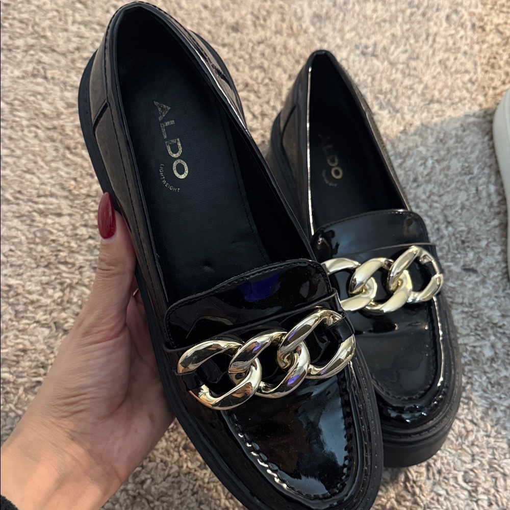ALDO Glossy Black Loafers with Bold Gold Chain